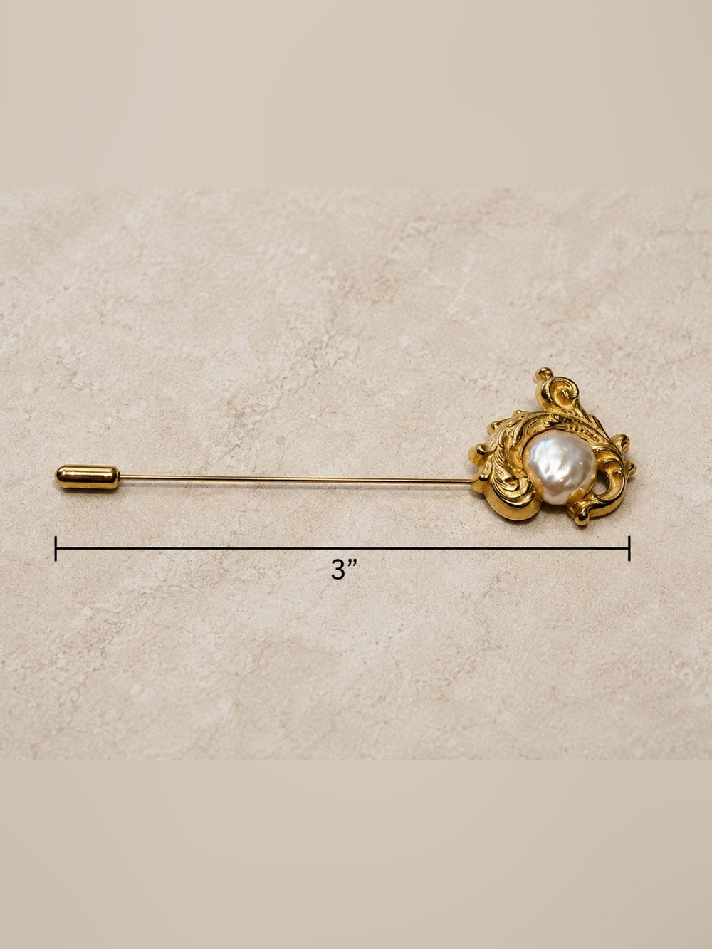 Richelieu gold tone lapel pin/ brooch with faux pearl